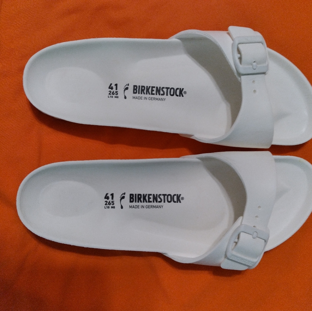 Birkenstock waterproof rubber sandals.